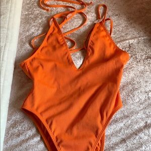 Orange one piece swim suit